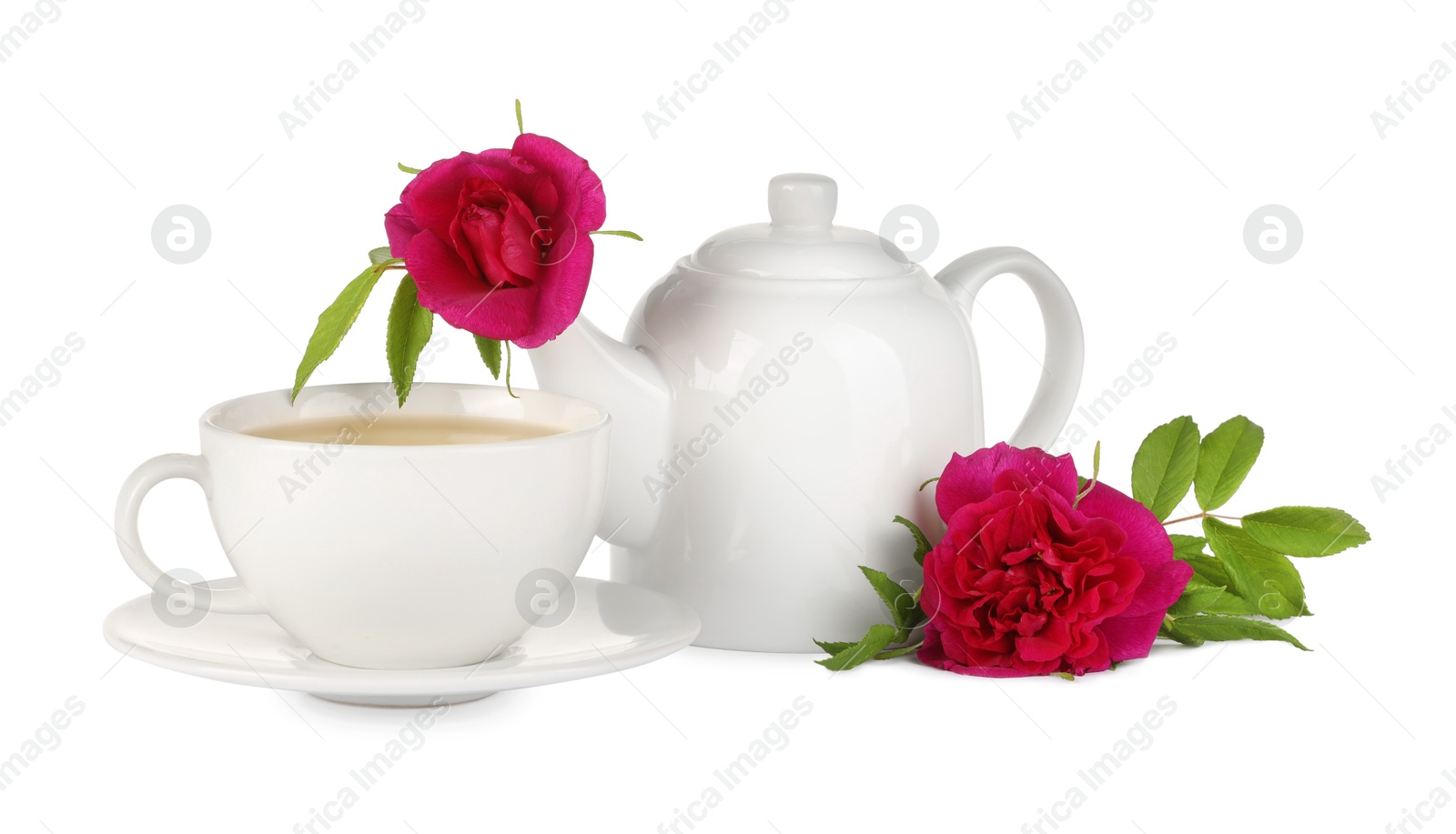 Photo of Aromatic herbal tea with rose flowers isolated on white