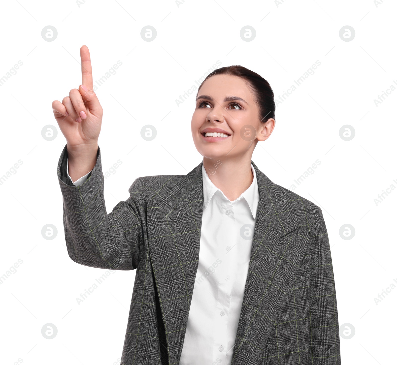 Photo of Beautiful businesswoman in suit pointing at something on white background