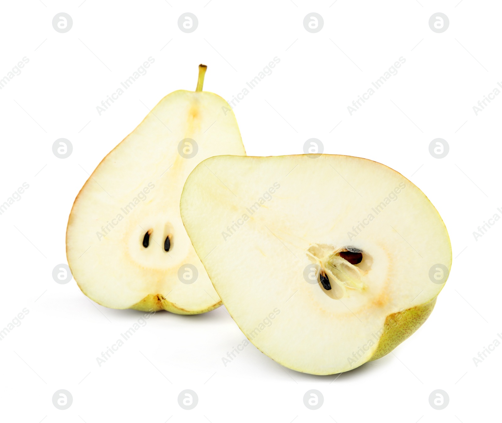 Photo of Halves of ripe juicy pears isolated on white