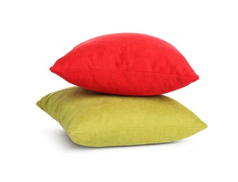 Different colorful decorative pillows on white background