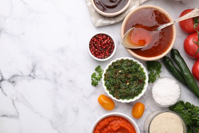 Photo of Different marinades and products on white marble table, flat lay. Space for text