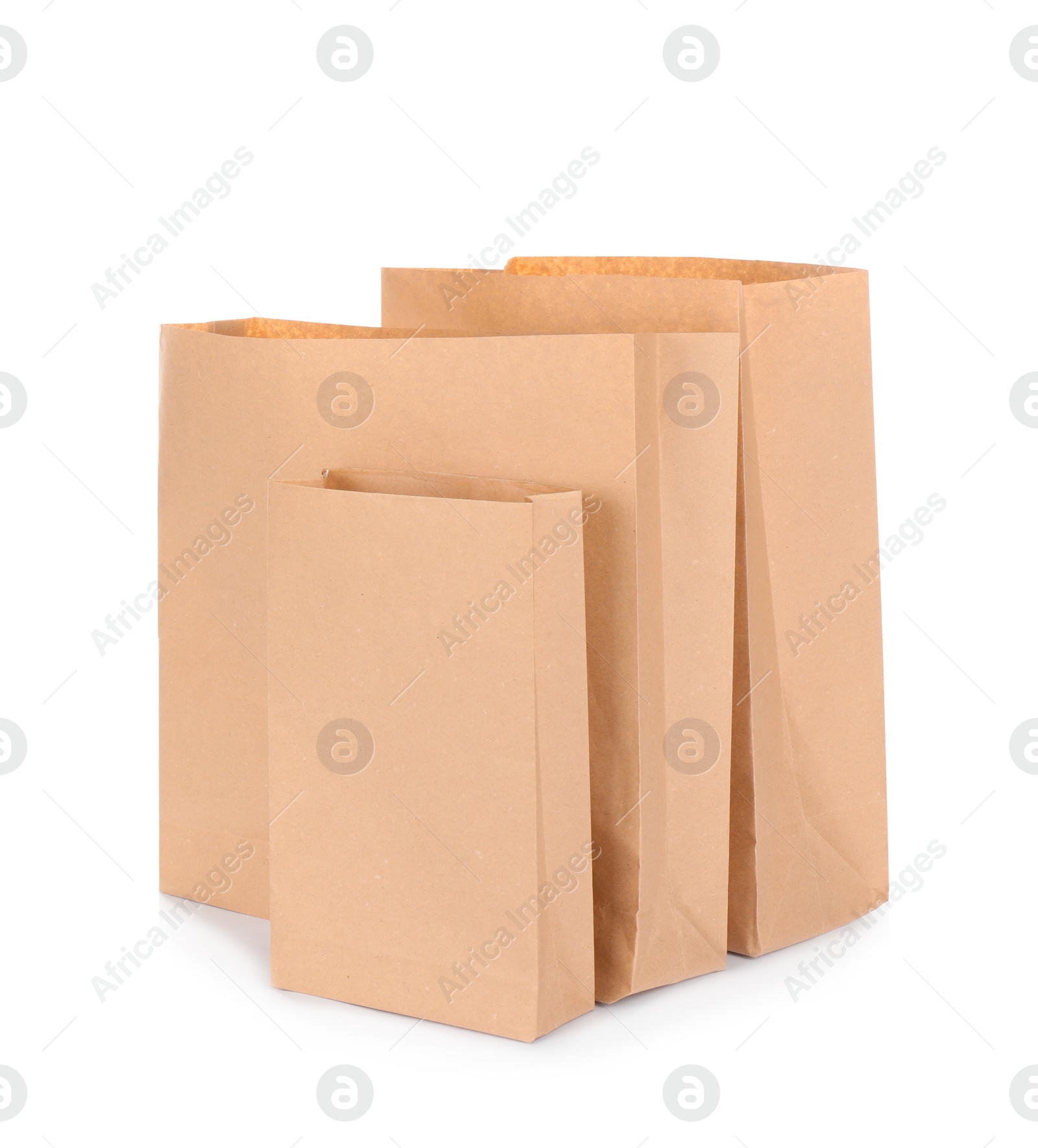 Photo of Paper bags isolated on white. Mockup for design