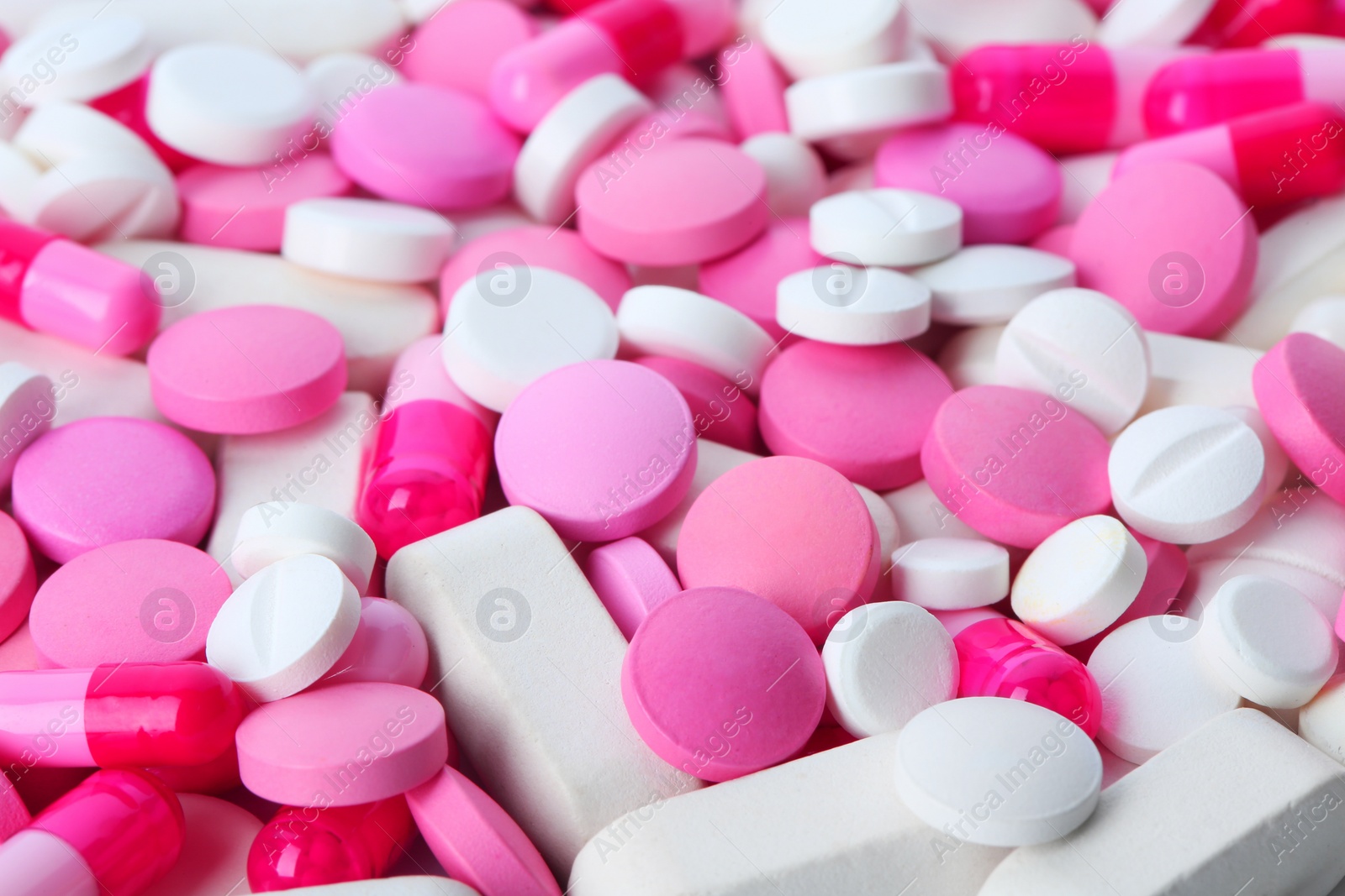 Photo of Assorted pills as background, closeup. Medical treatment