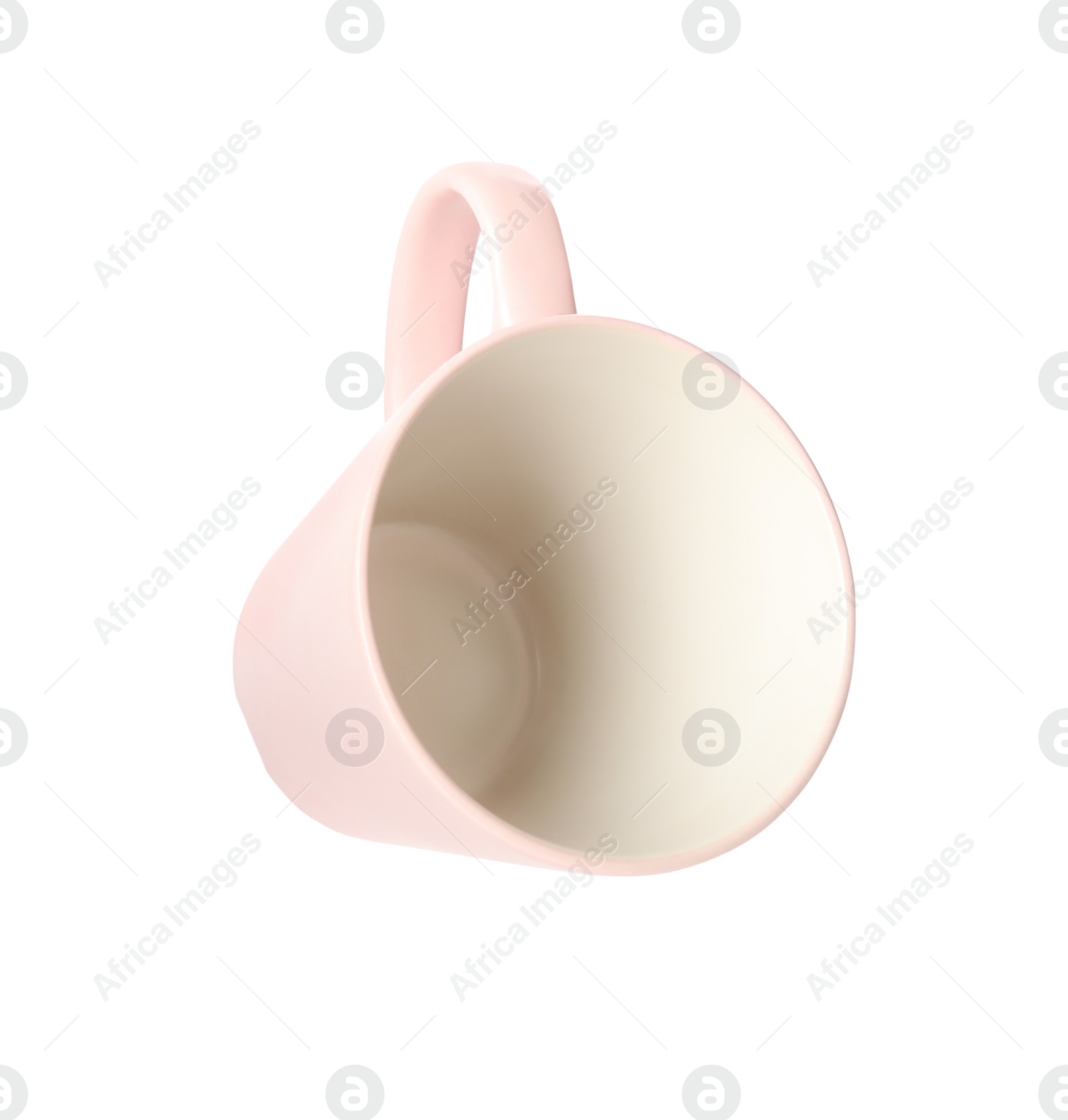 Photo of Clean light pink cup isolated on white