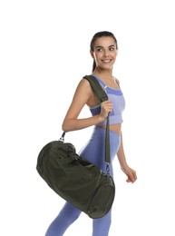 Beautiful woman with sports bag on white background