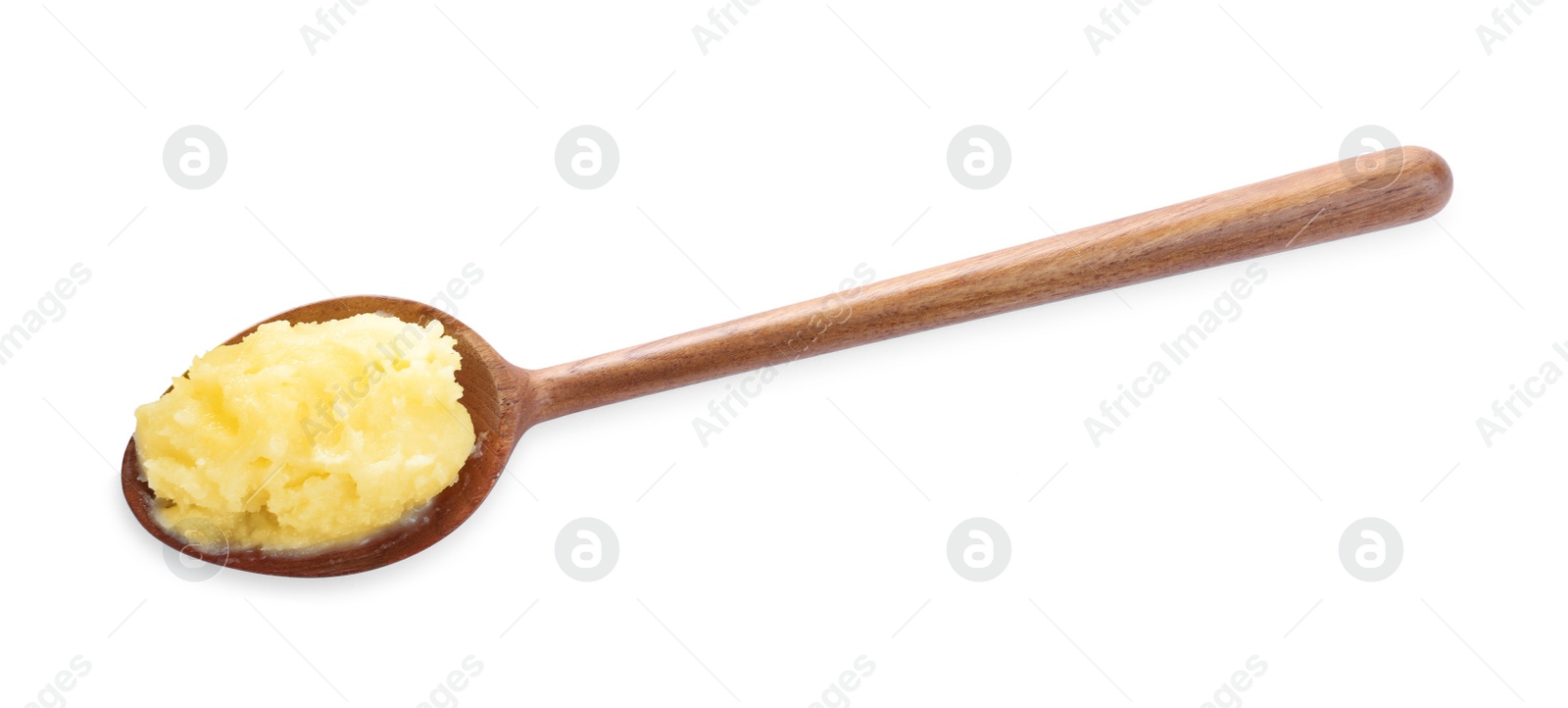 Photo of Wooden spoon of Ghee butter isolated on white, top view