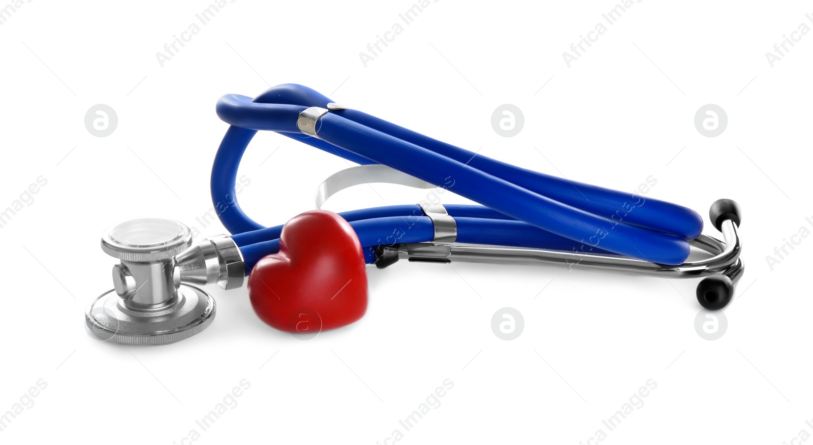 Photo of Stethoscope and small red heart on white background. Heart attack concept