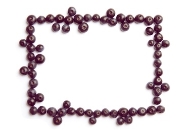 Photo of Frame made of fresh acai berries on white background