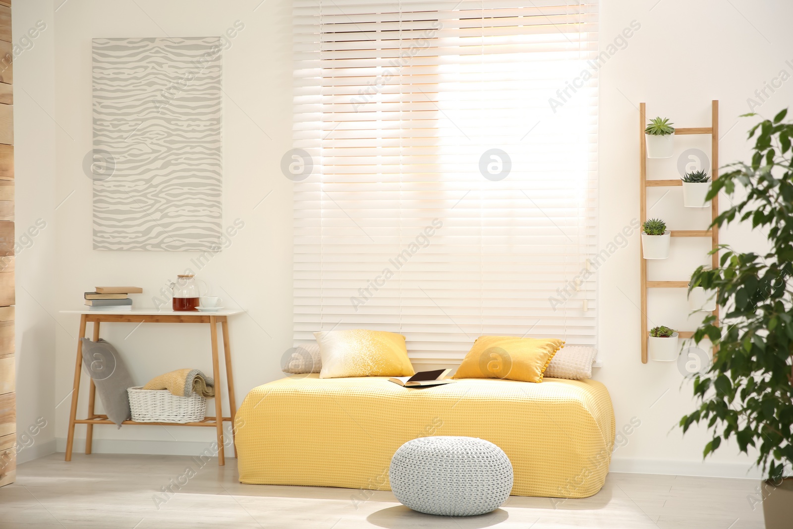 Photo of Comfortable place for relax near window at home