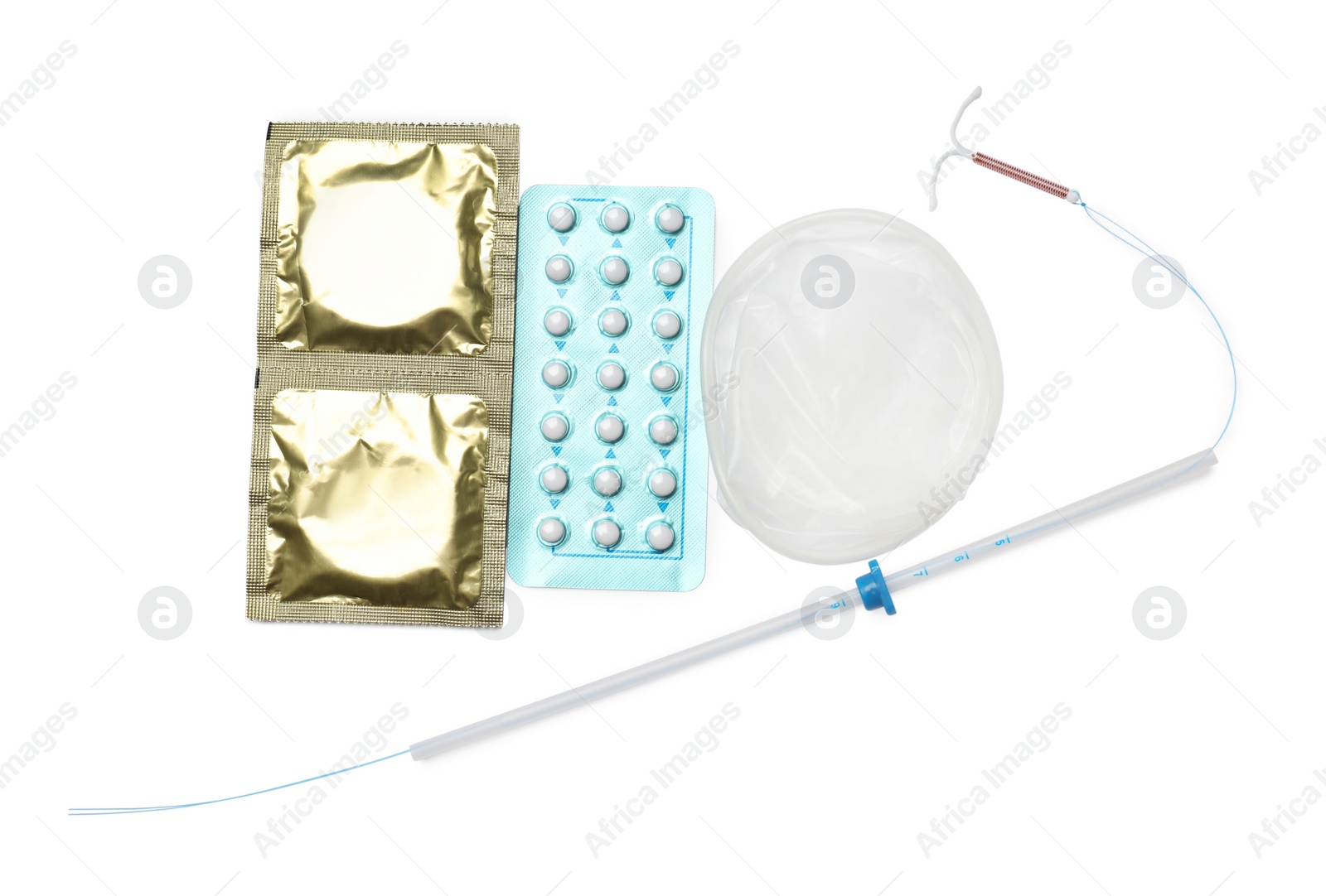 Photo of Contraceptive pills, condoms and intrauterine device isolated on white, top view. Different birth control methods