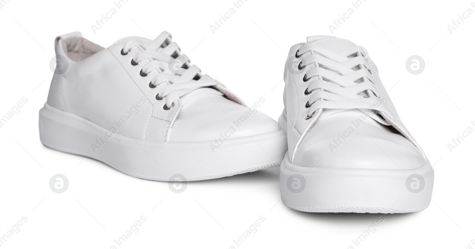 Photo of Pair of stylish sneakers isolated on white