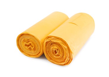 Two rolls of yellow garbage bags isolated on white