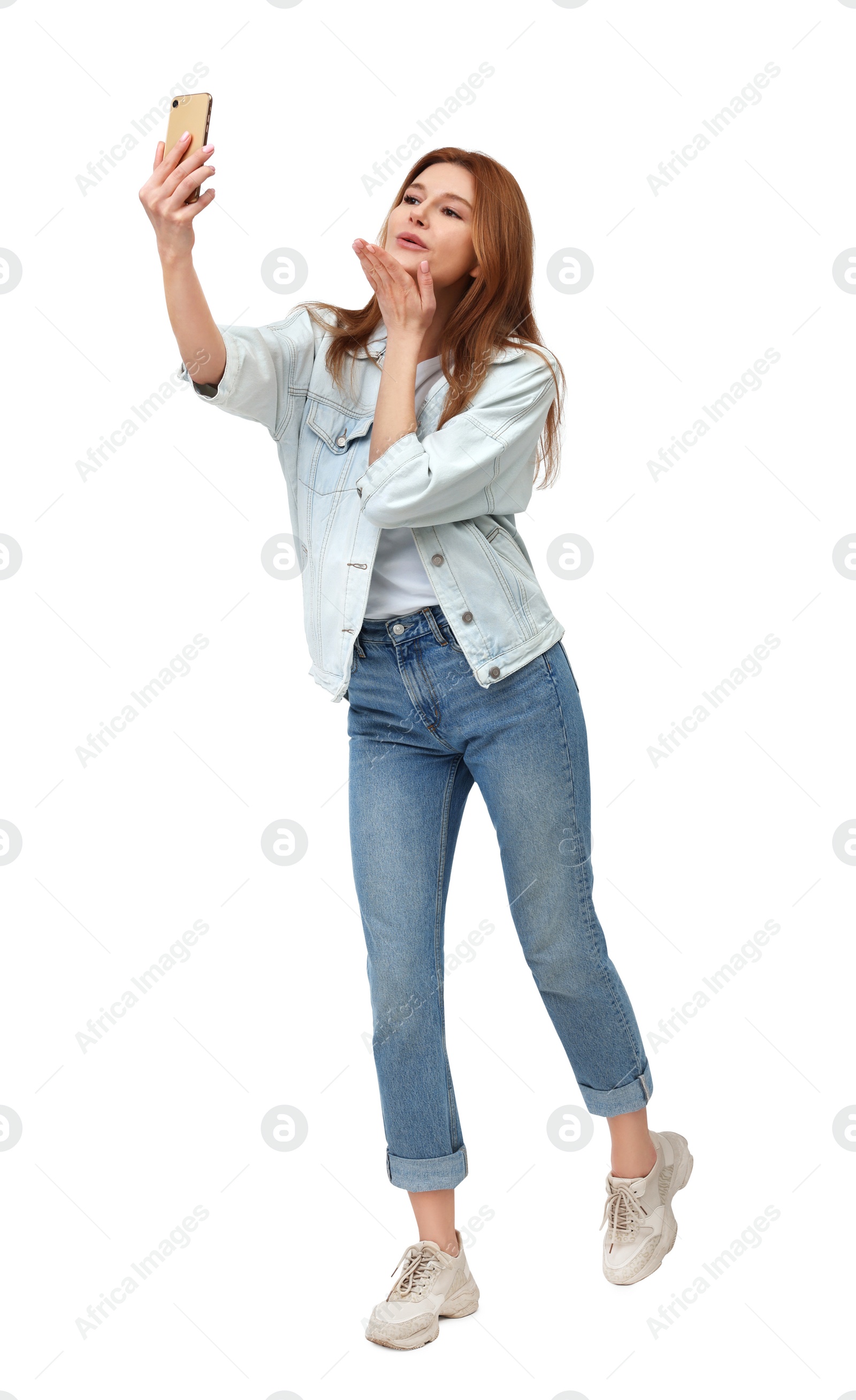 Photo of Beautiful woman taking selfie on white background