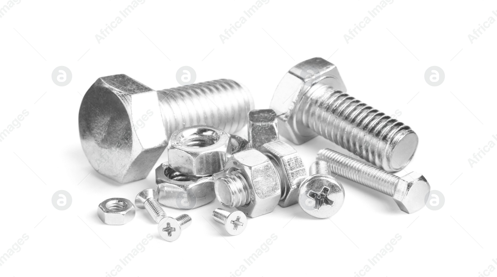 Photo of Different metal bolts and nuts on white background