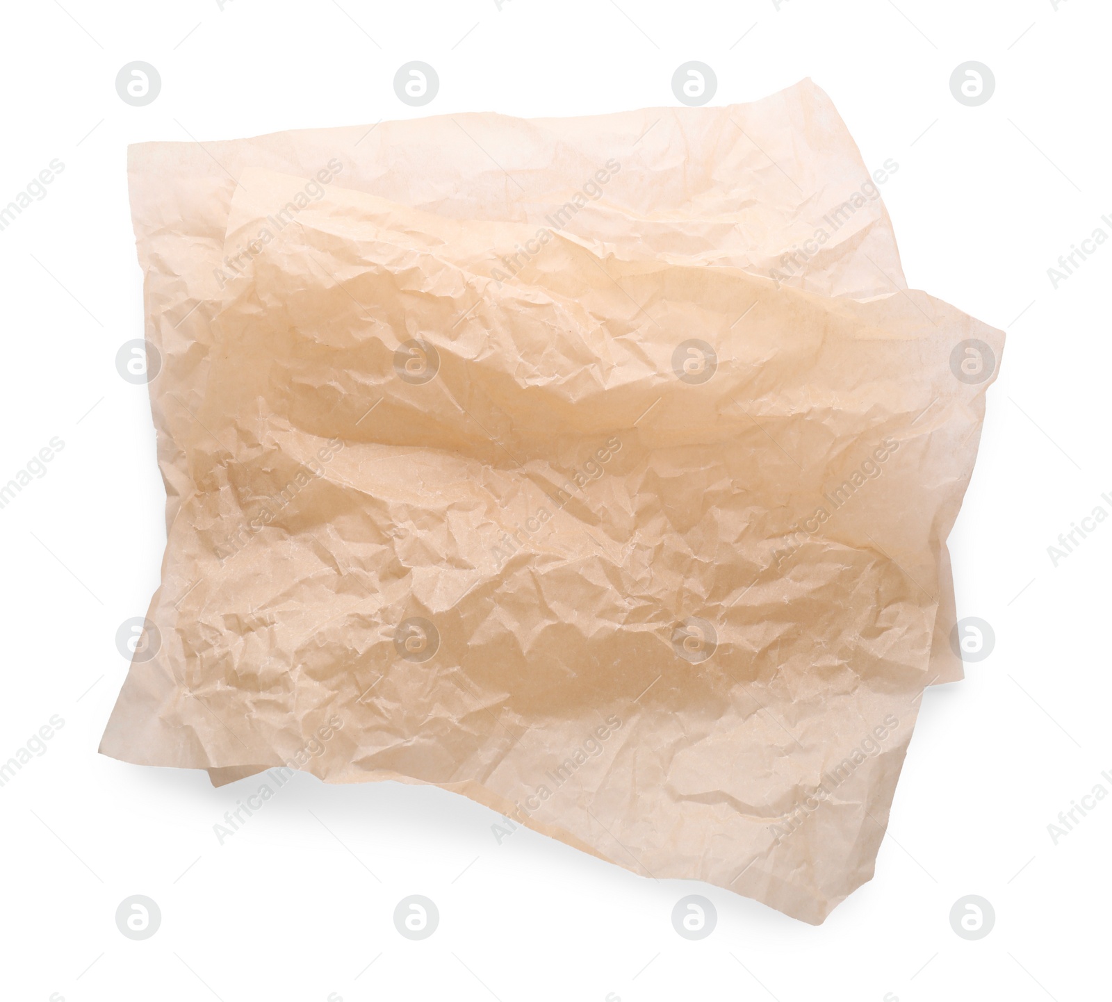 Photo of Sheets of crumpled baking paper isolated on white