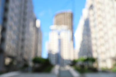 Photo of Blurred view of modern buildings in city