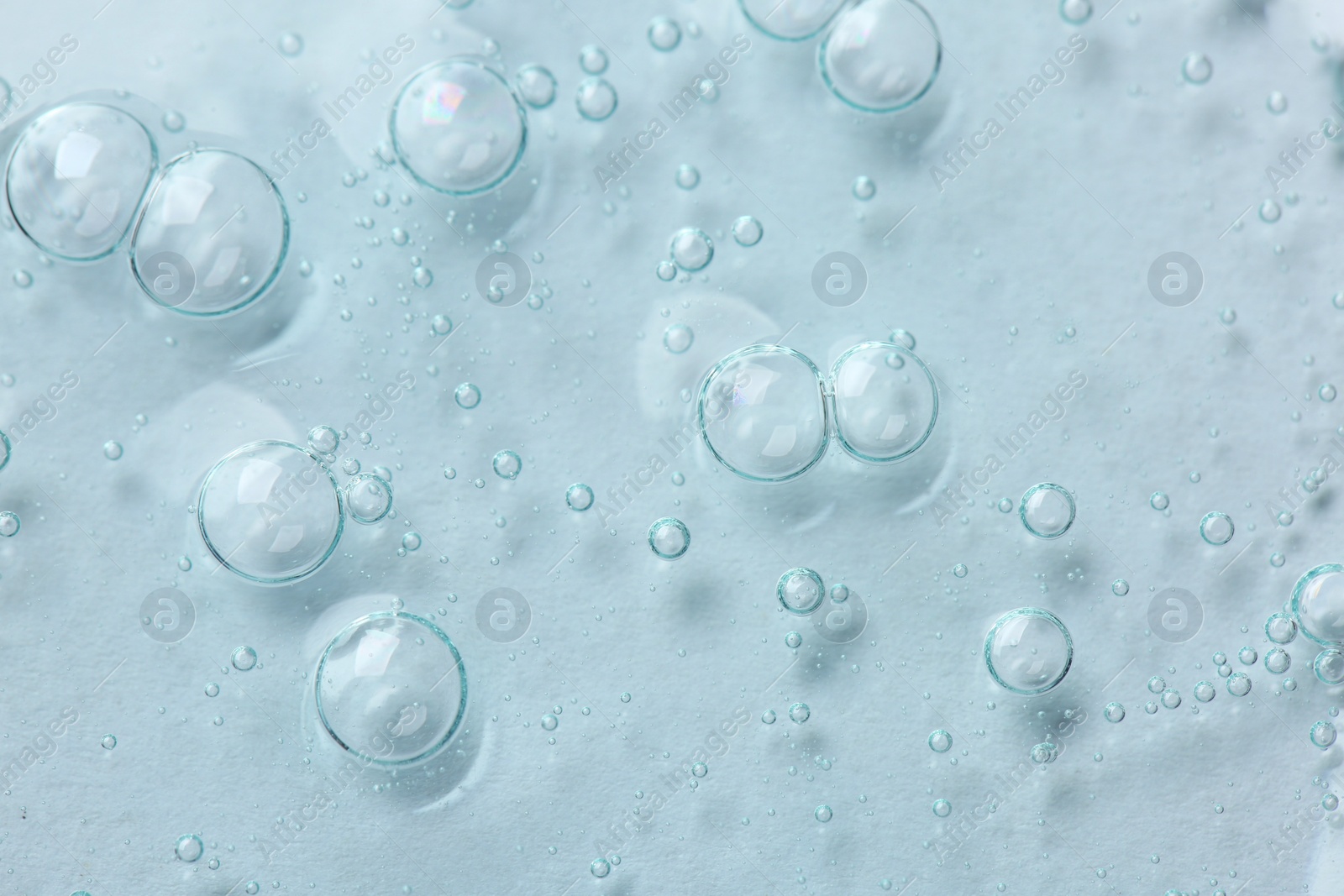 Photo of Cosmetic serum on white background, above view