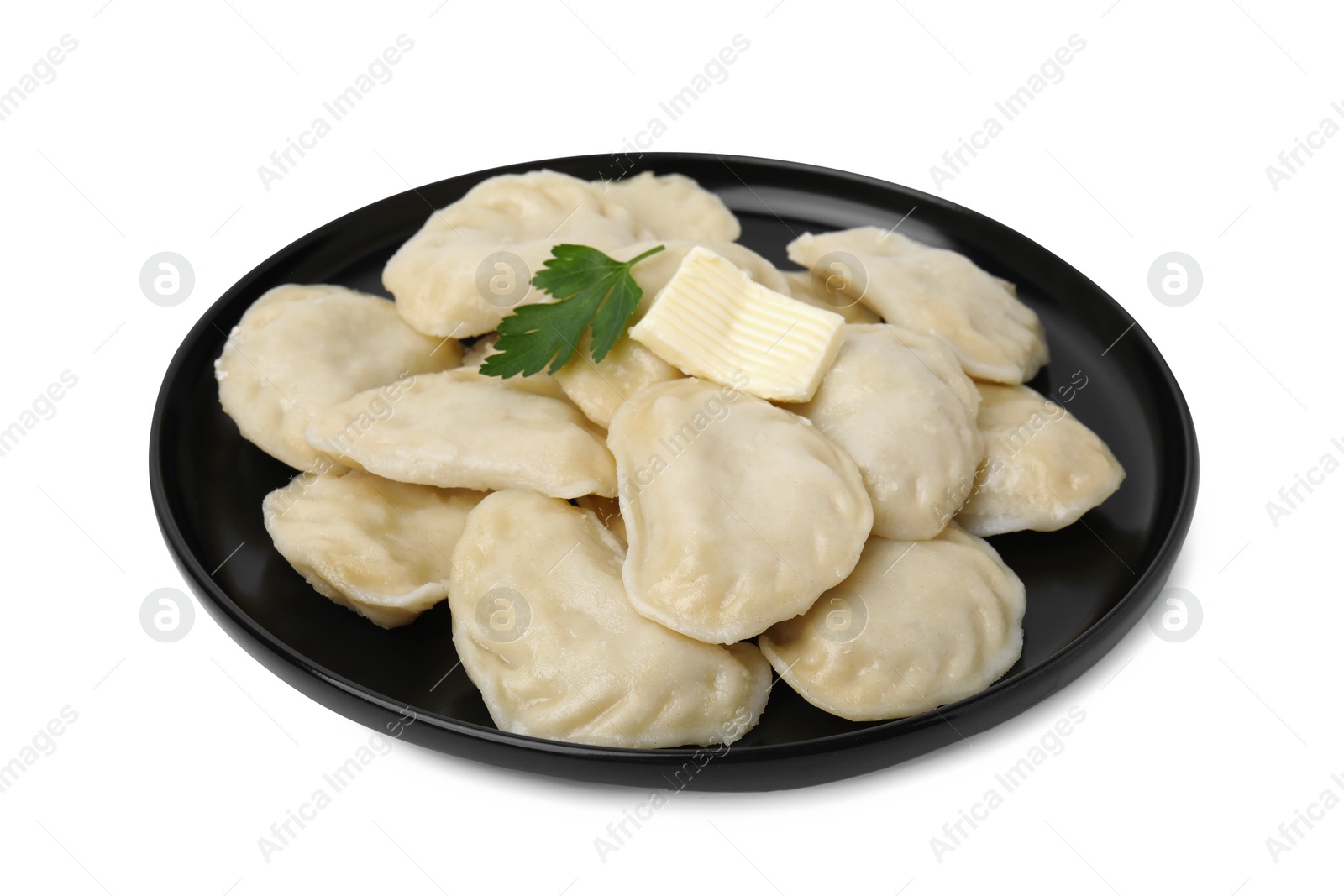 Photo of Delicious dumplings (varenyky) with tasty filling, butter and parsley isolated on white
