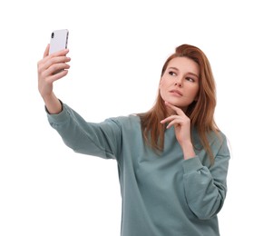 Photo of Beautiful woman taking selfie on white background