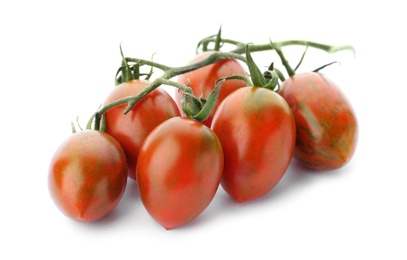 Photo of Branch of red grape tomatoes on white background