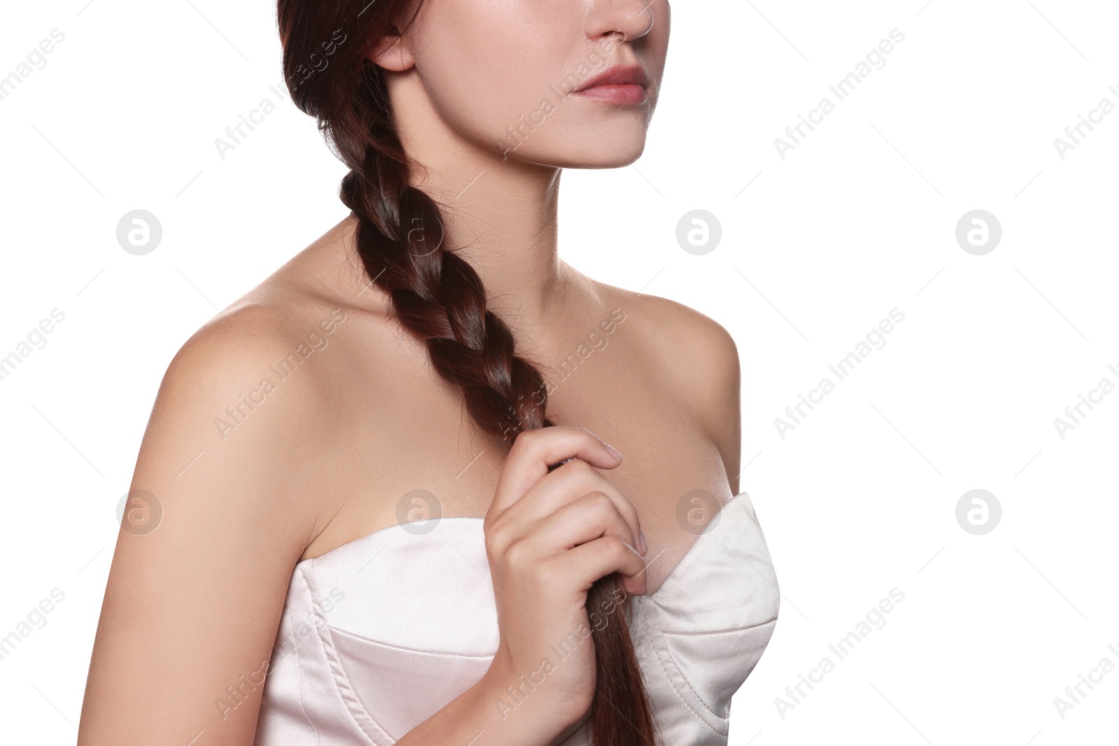 Photo of Beautiful young woman with healthy strong hair on white background, closeup