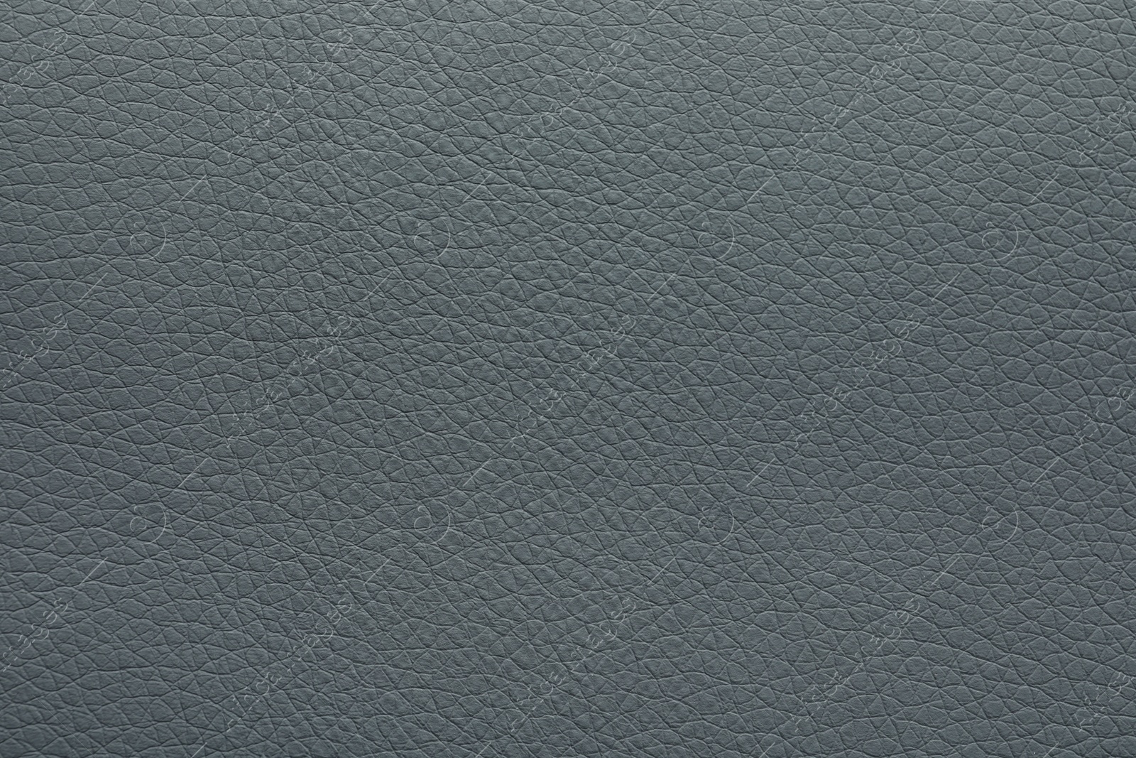 Photo of Texture of grey leather as background, closeup