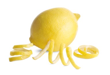 Photo of Peel of lemon and fresh fruit on white background. Citrus zest