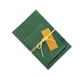 Photo of Reusable beeswax food wraps on white background, top view