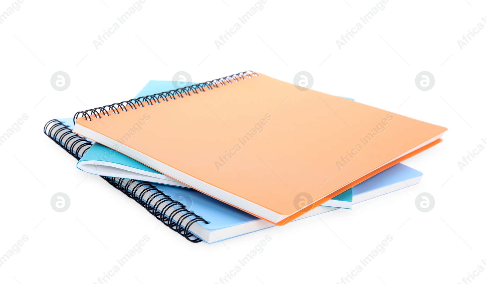 Photo of Many different notebooks isolated on white. School stationery