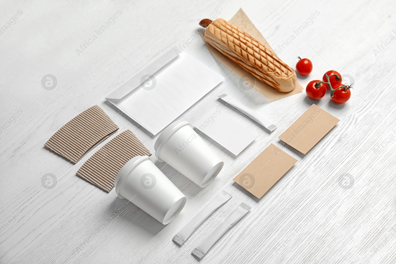 Photo of Composition with items for mock up design on wooden background. Food delivery service