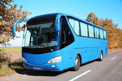 Modern blue bus on road. Passenger transportation