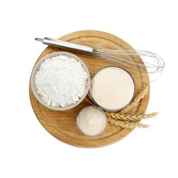 Leaven, whisk, ears of wheat and flour isolated on white, top view