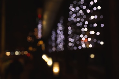 Photo of Beautiful street lights at night. Bokeh effect