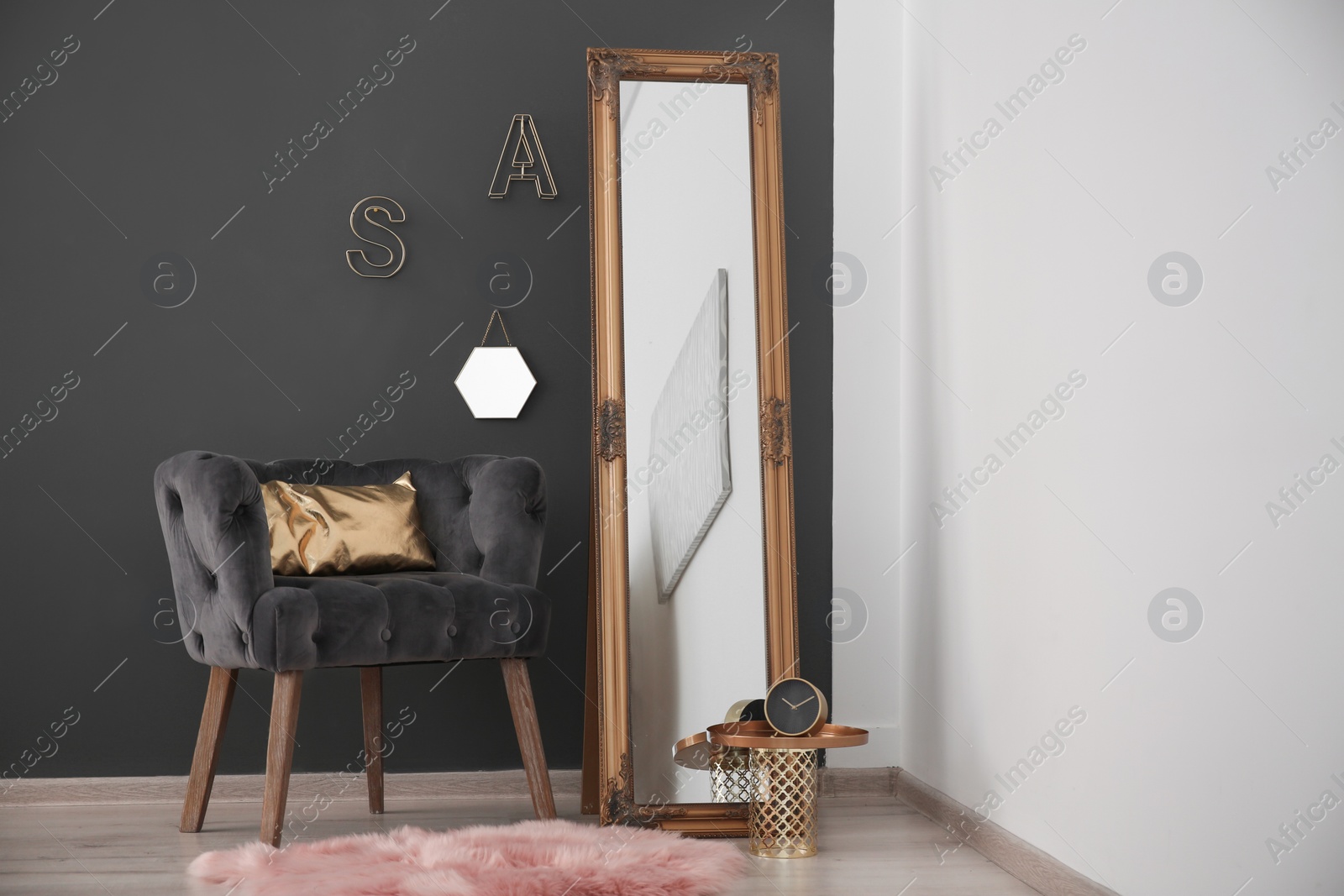 Photo of Modern room interior with large mirror and armchair
