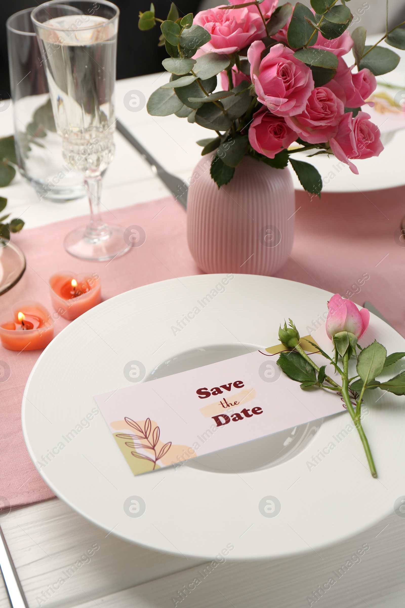 Photo of Romantic table setting with flowers and candles