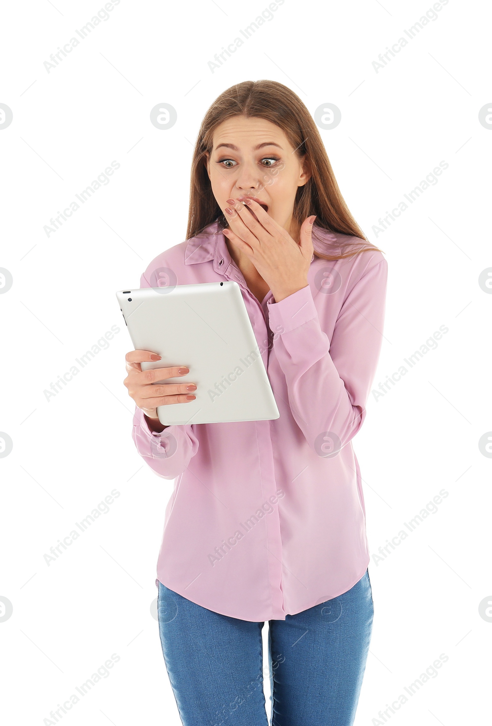 Photo of Emotional young woman with tablet celebrating victory on white background