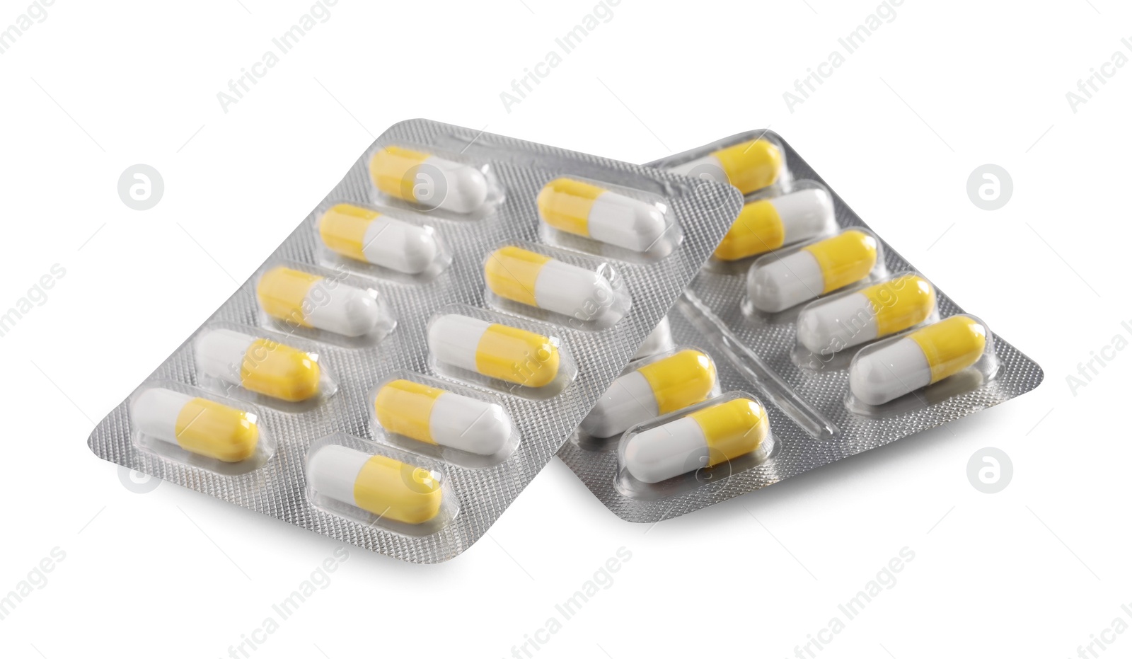 Photo of Blisters with pills on white background. Medicinal treatment