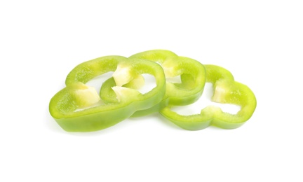 Photo of Slices of ripe green bell pepper isolated on white