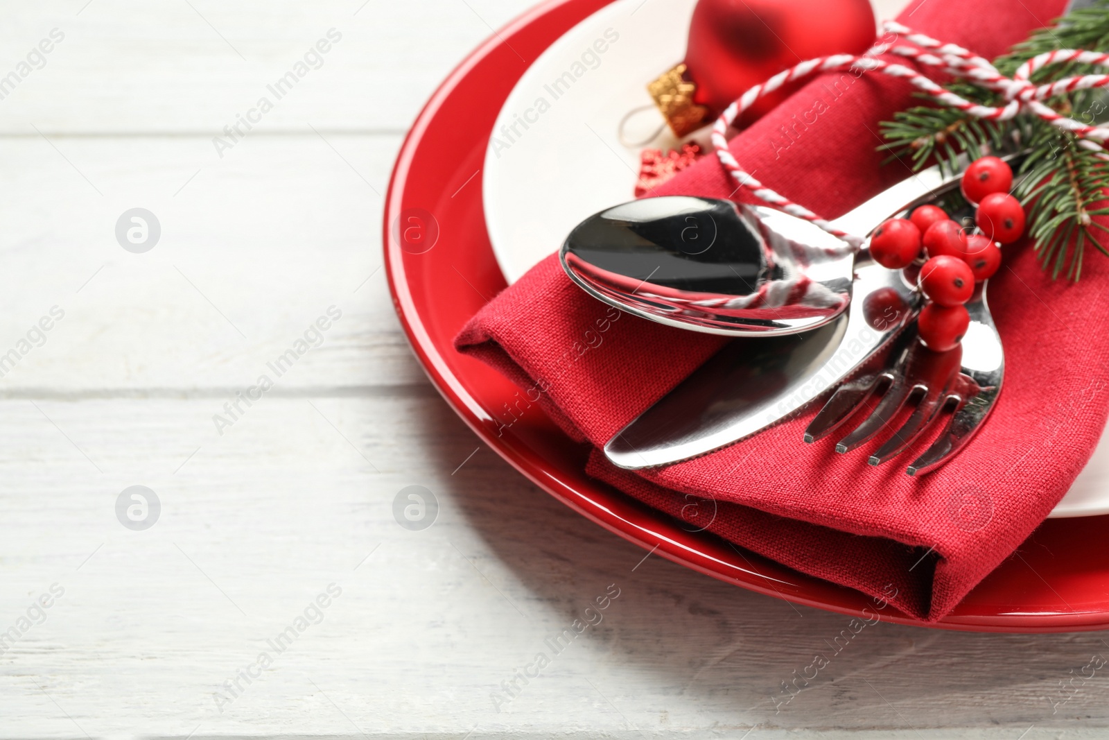 Photo of Beautiful Christmas table setting on white wooden background