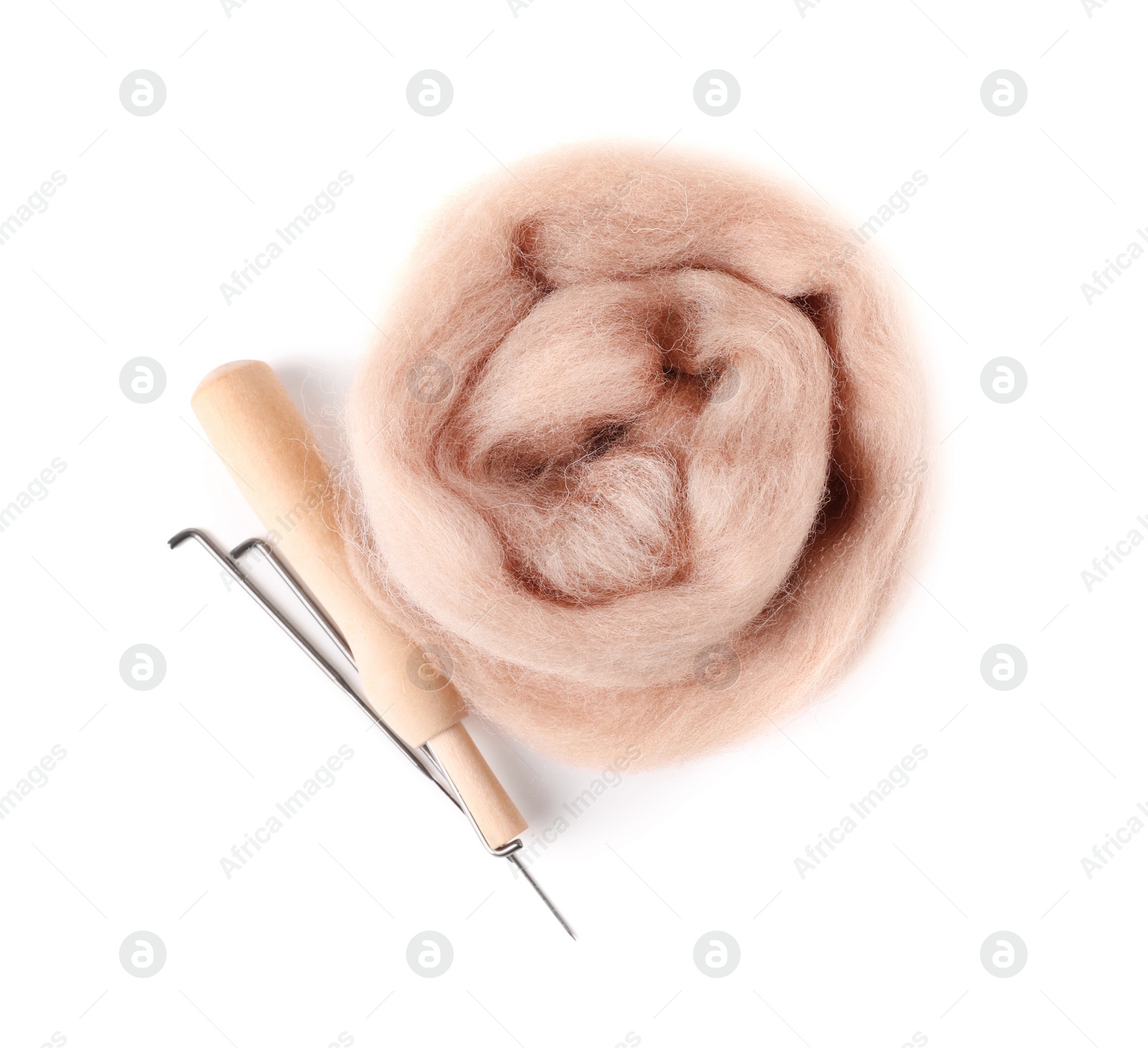 Photo of Beige felting wool and needles isolated on white, top view