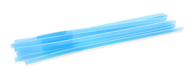 Photo of Light blue plastic cocktail straws on white background