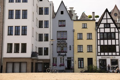 Photo of Cologne, Germany - August 28, 2022: Beautiful residential buildings on city street