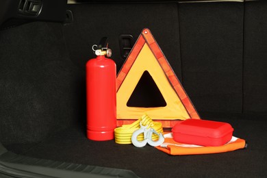 Photo of Set of car safety equipment in trunk
