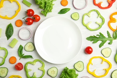 Photo of Flat lay composition with fresh salad ingredients on white wooden table, space for text