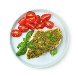 Photo of Delicious chicken breast with pesto sauce, tomatoes and basil isolated on white, top view