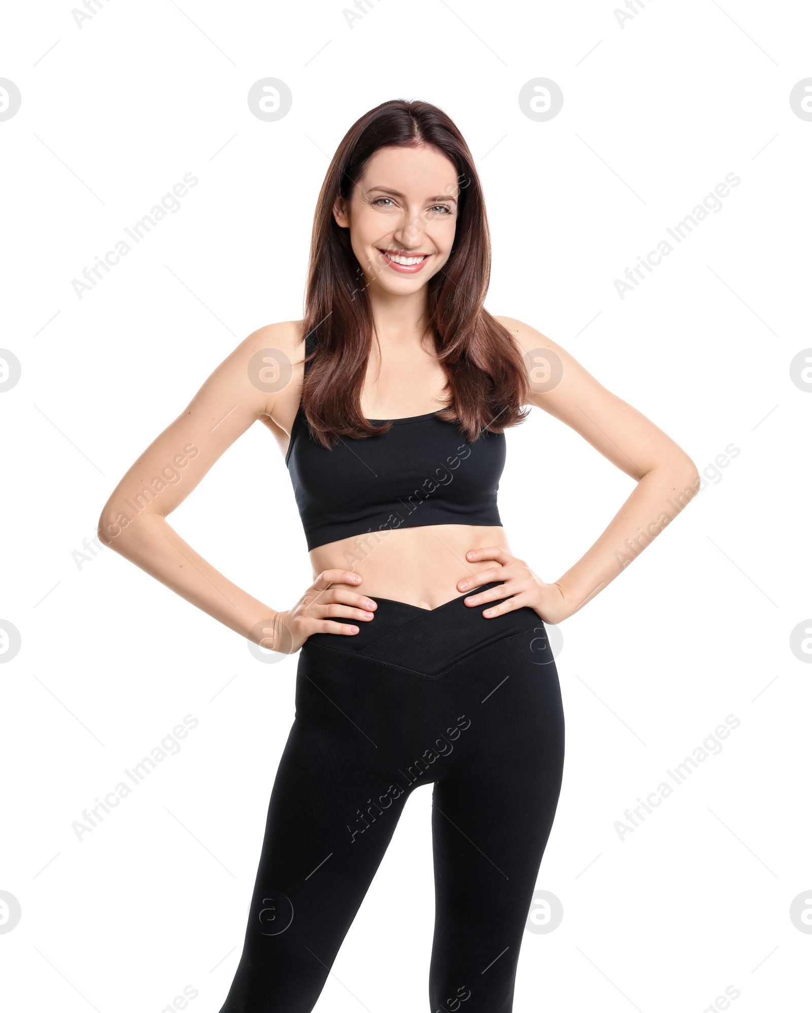 Photo of Happy young woman with slim body posing on white background