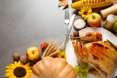 Photo of Flat lay composition with turkey on grey background, space for text. Happy Thanksgiving day