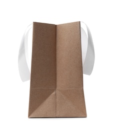 Paper shopping bag with ribbon handles on white background