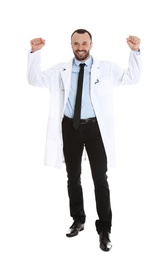 Full length portrait of happy male doctor isolated on white. Medical staff