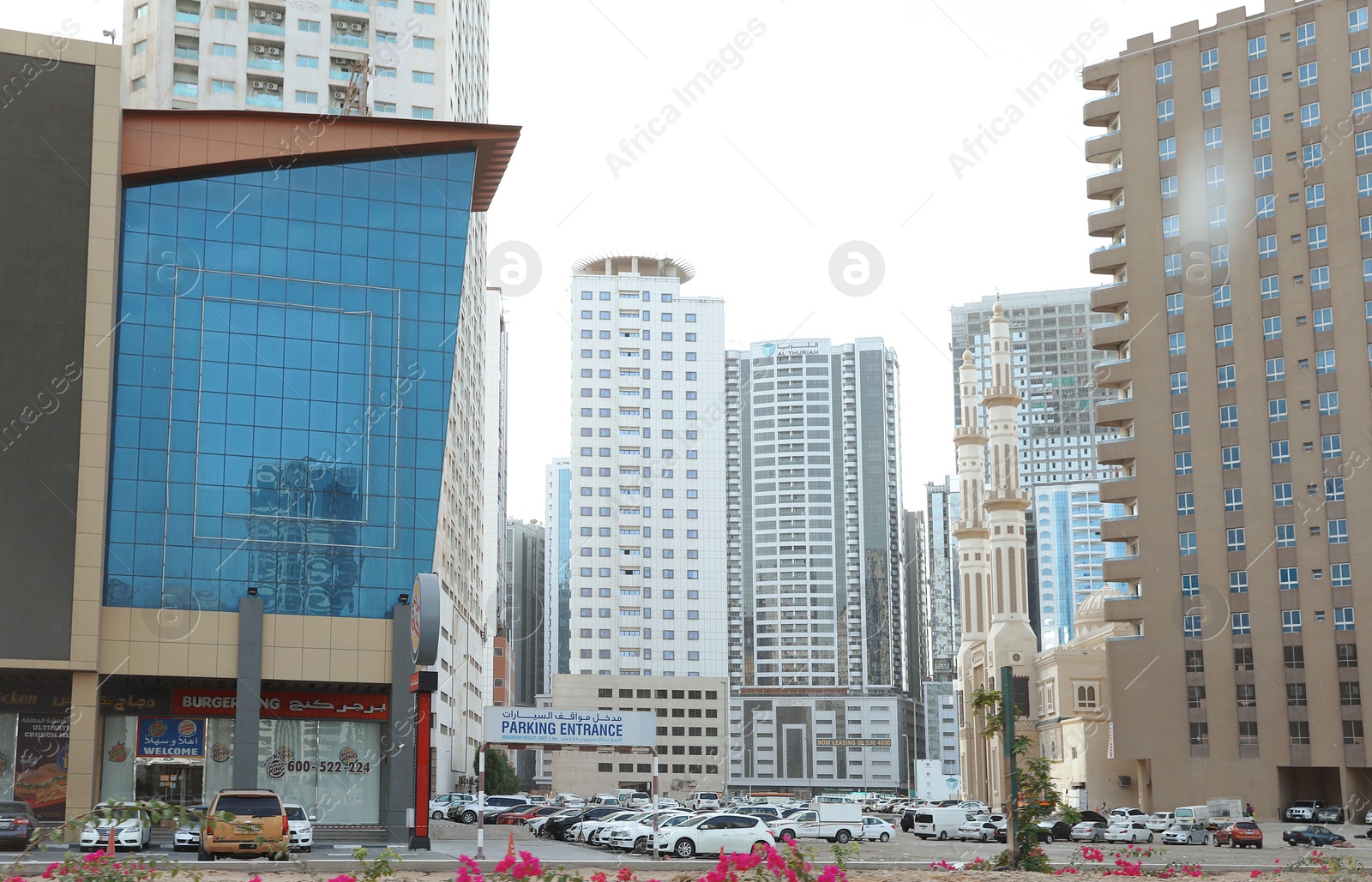 Photo of DUBAI, UNITED ARAB EMIRATES - NOVEMBER 06, 2018: Cityscape with modern buildings and mosque